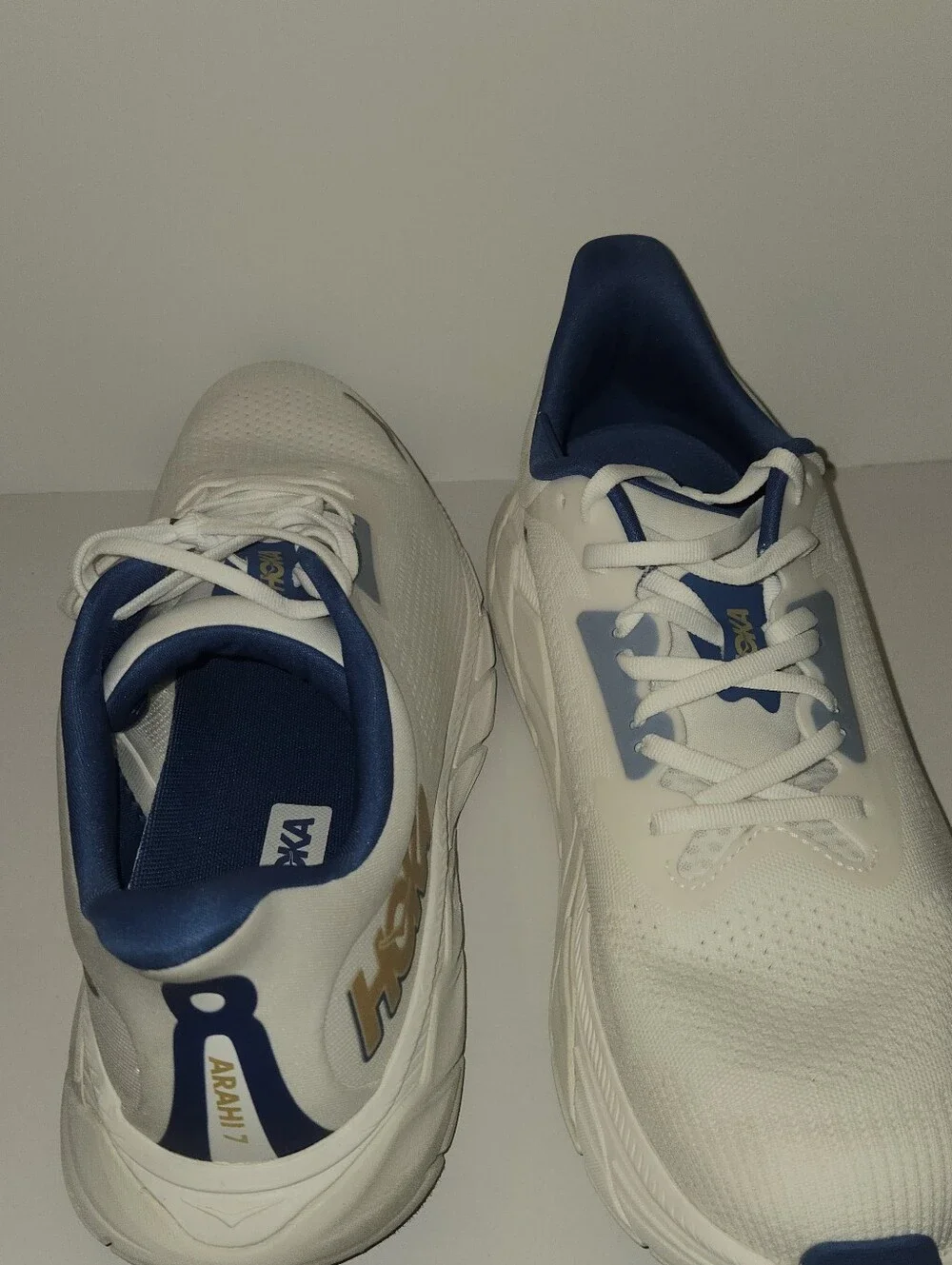 Hoka One One White and Navy Athletic Running Shoes with Gold Logo